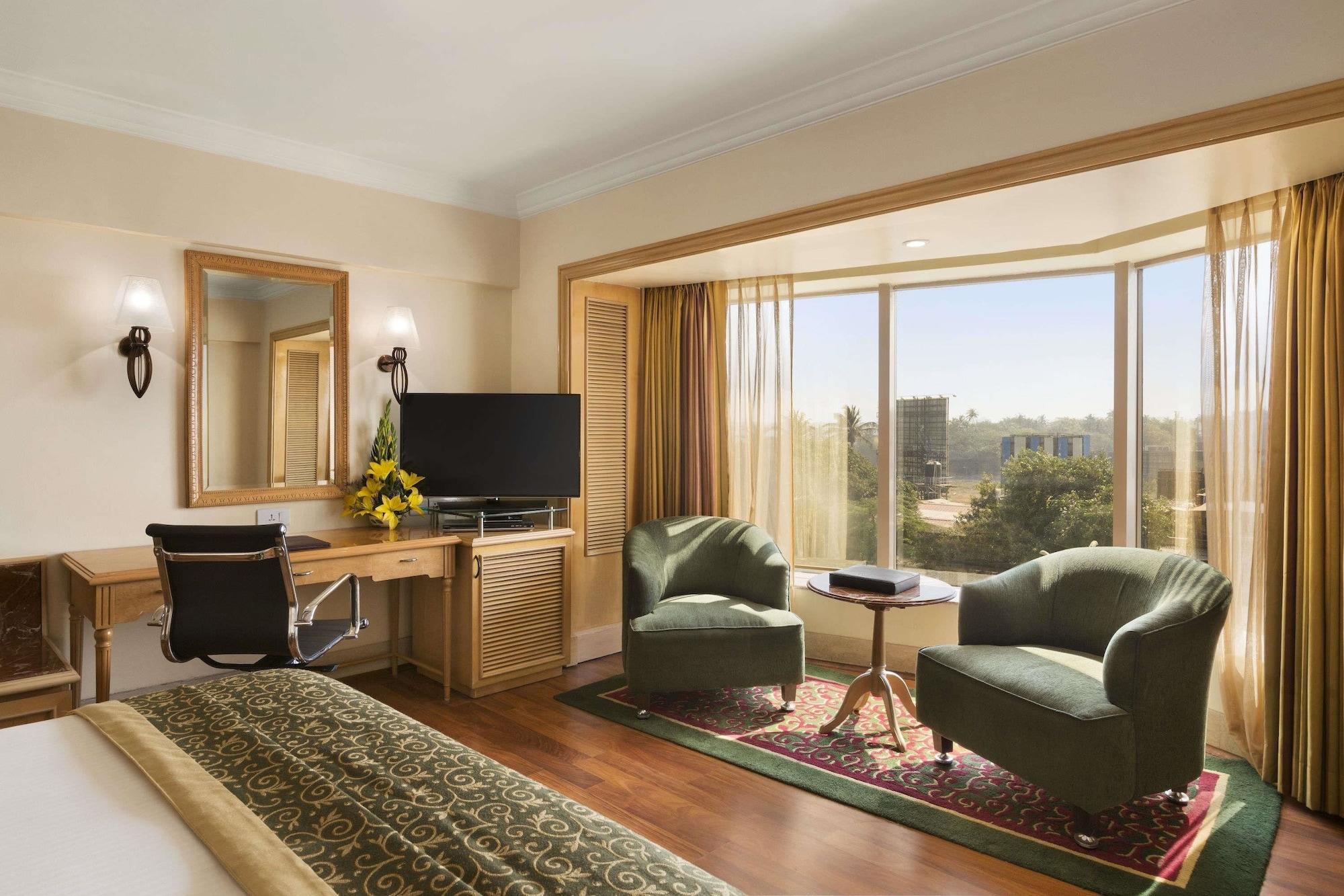 Hotel Ramada Plaza By Wyndham Palm Grove Mumbai Exterior foto A room at the Taj Bengal