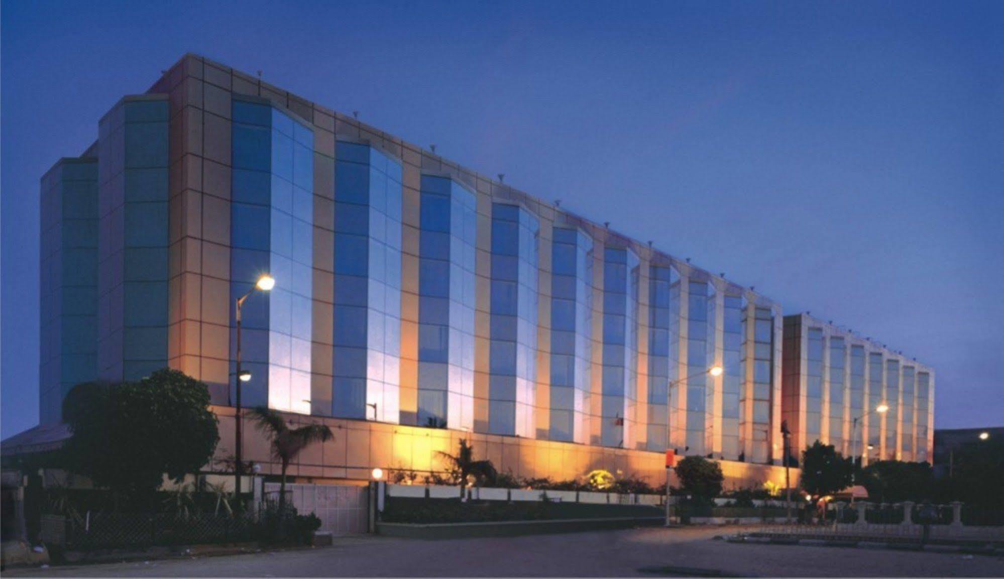 Hotel Ramada Plaza By Wyndham Palm Grove Mumbai Exterior foto The 5-star Grand Hotel